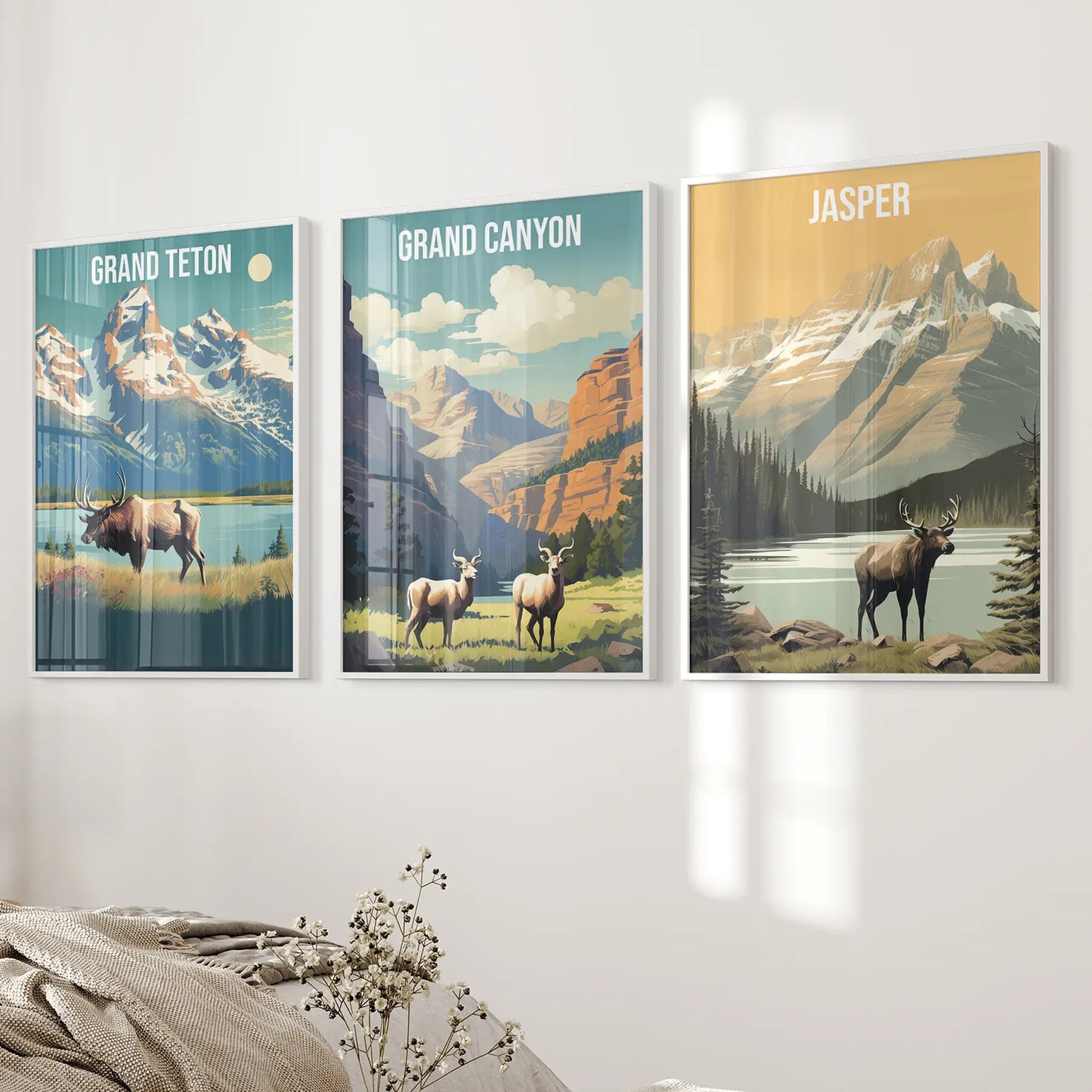 National park mountains prints. Wyoming travel print wall art. White frames above the bed.