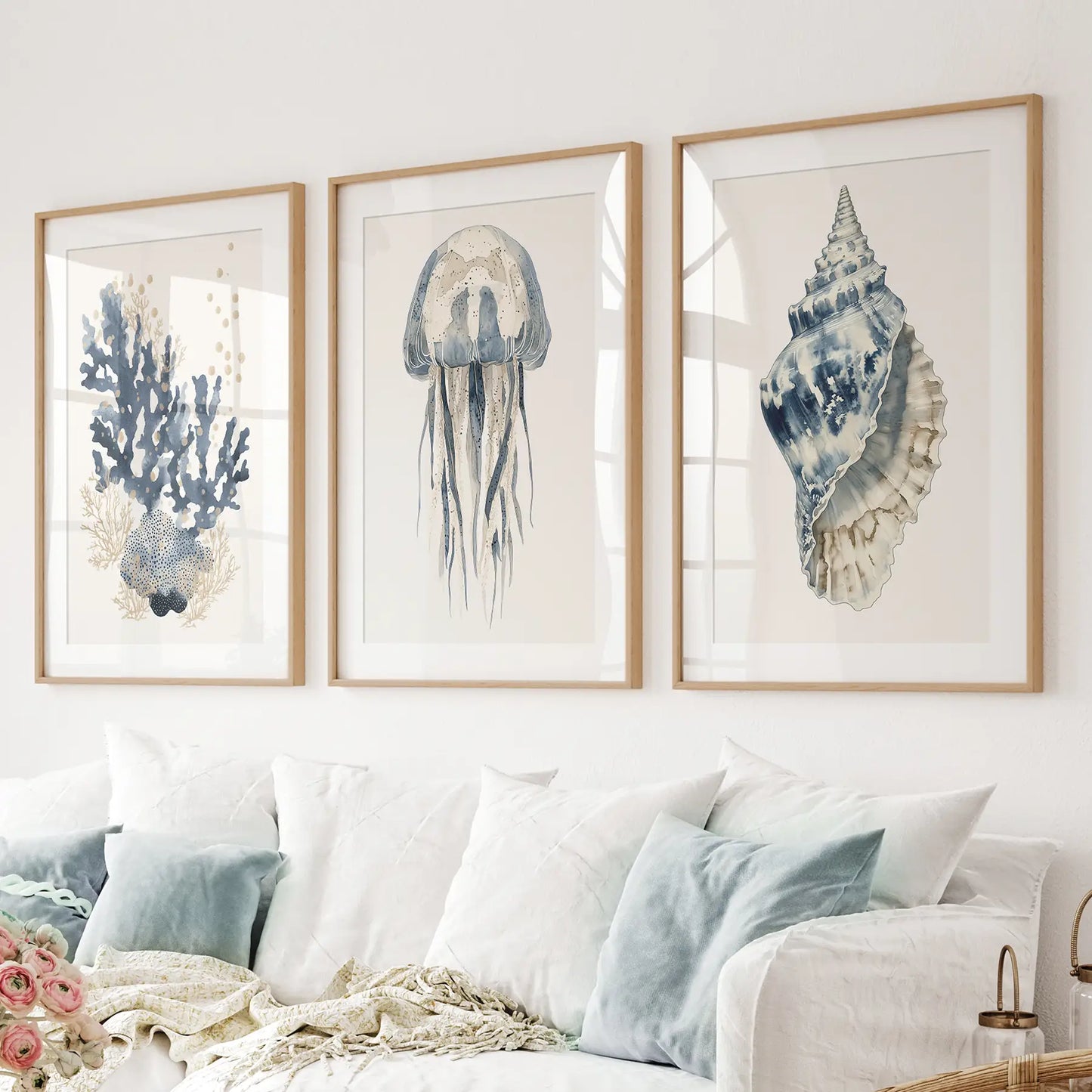 Jellyfish watercolor style painting. Sea life marine wall decor. Thinwood frames with mat above the sofa.