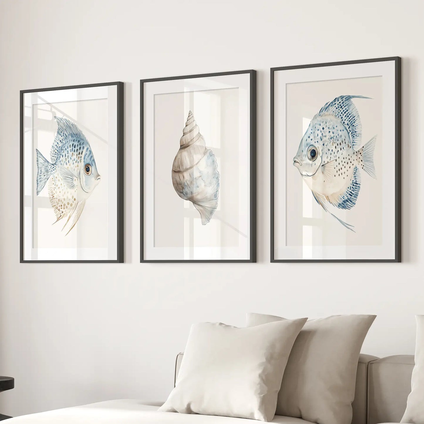 Minimalist coastal shell print. Nautical sea life decor. Black frames with mat over the couch.