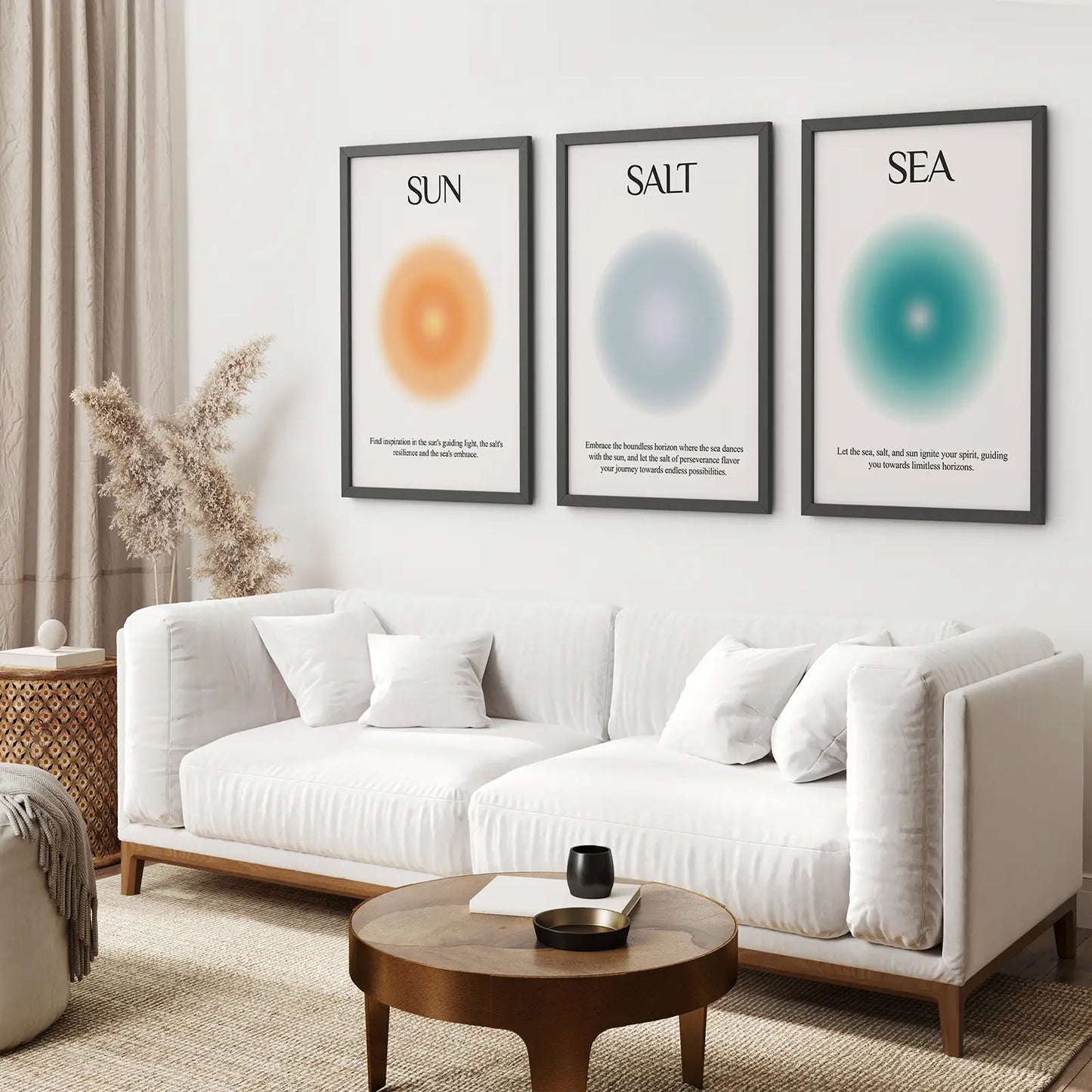 Coastal home décor wall art set Sun Salt Sea minimalist design. Black frames above the sofa.