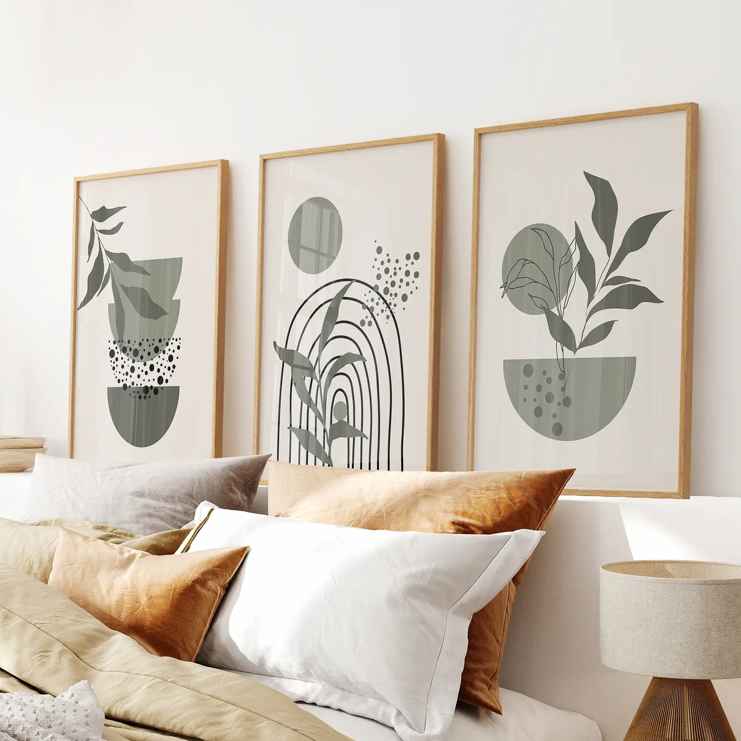Minimalist botanical posters with abstract leaves and shapes, set of 3 wall art prints. Thinwood Frames Over the Bed.