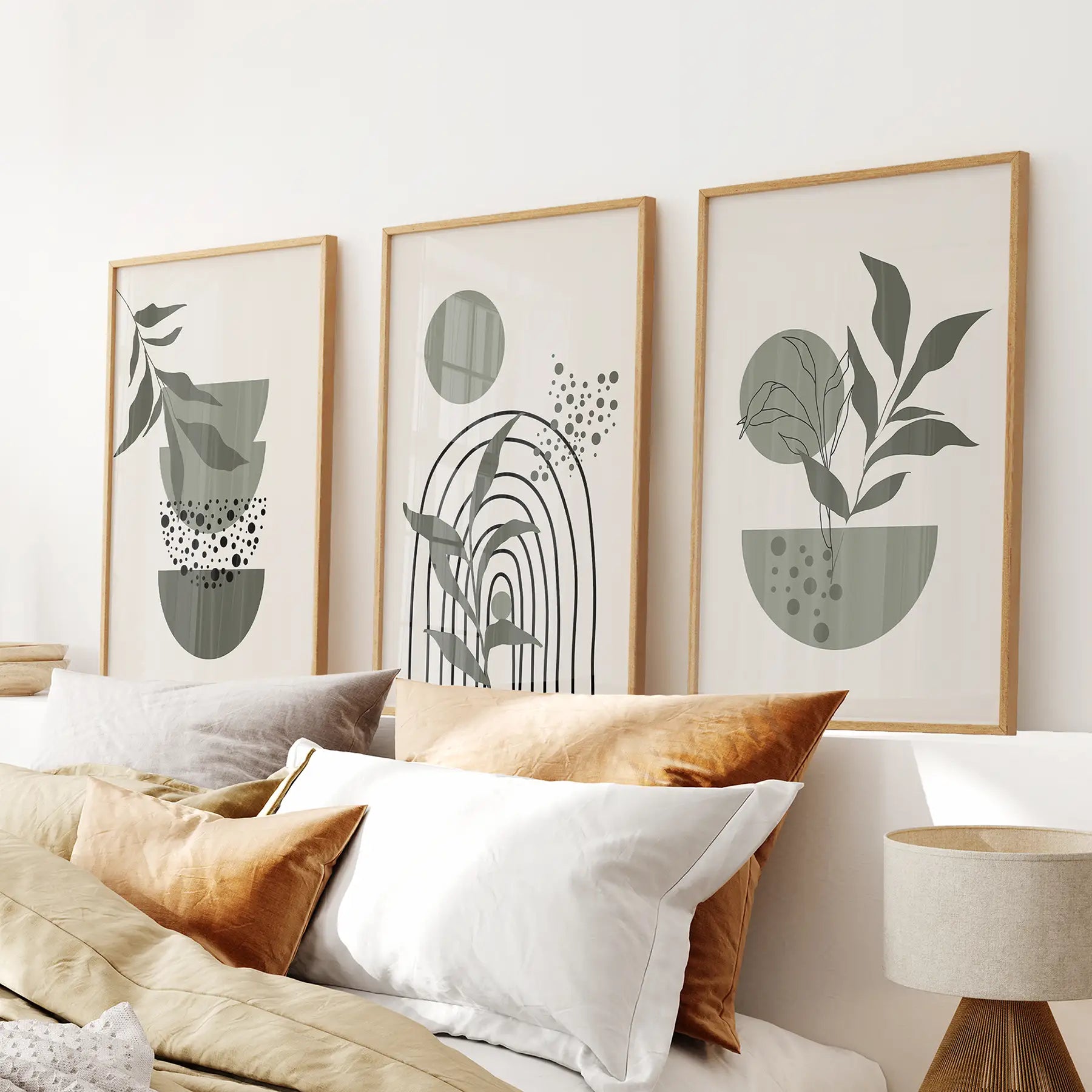 Minimalist botanical posters with abstract leaves and shapes, set of 3 wall art prints. Thinwood Frames Over the Bed.