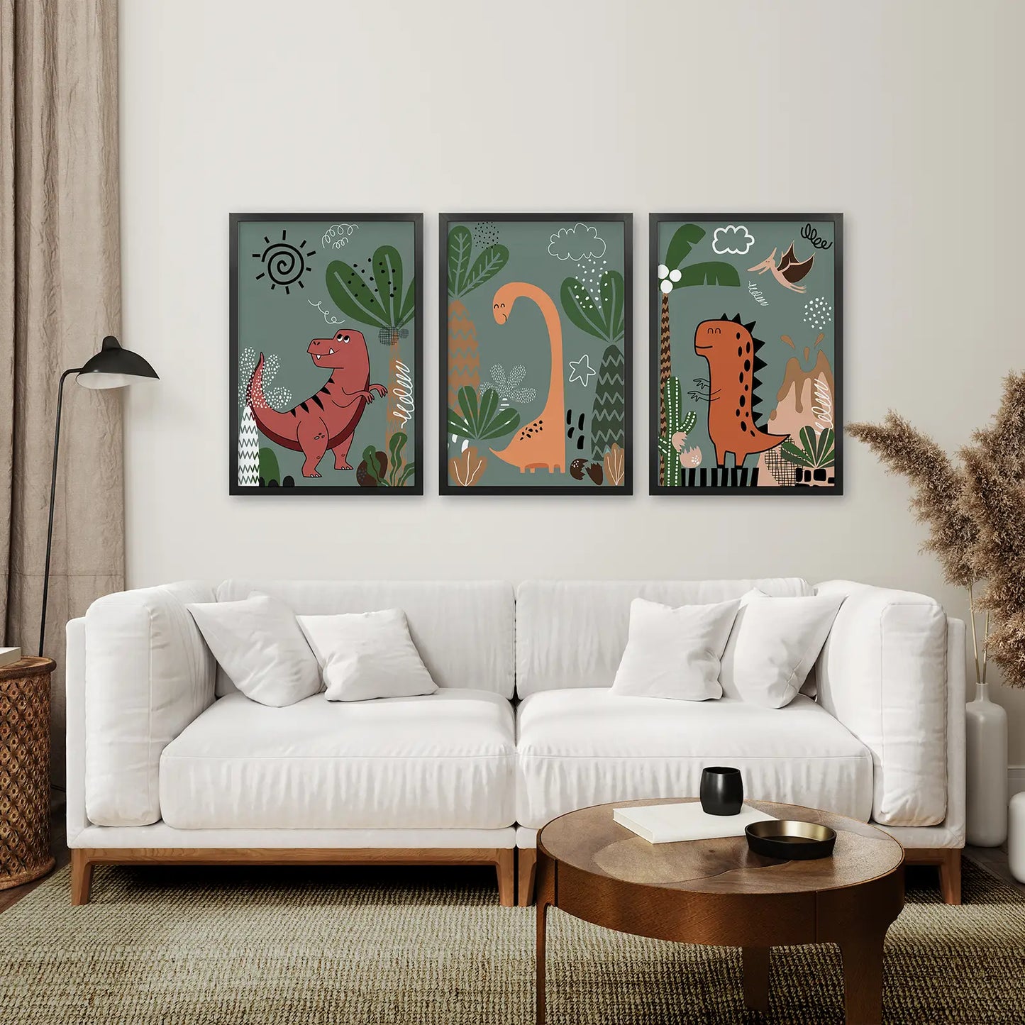 Modern dino art prints set for boys’ nursery room with playful dinosaurs. Black frames over the couch.