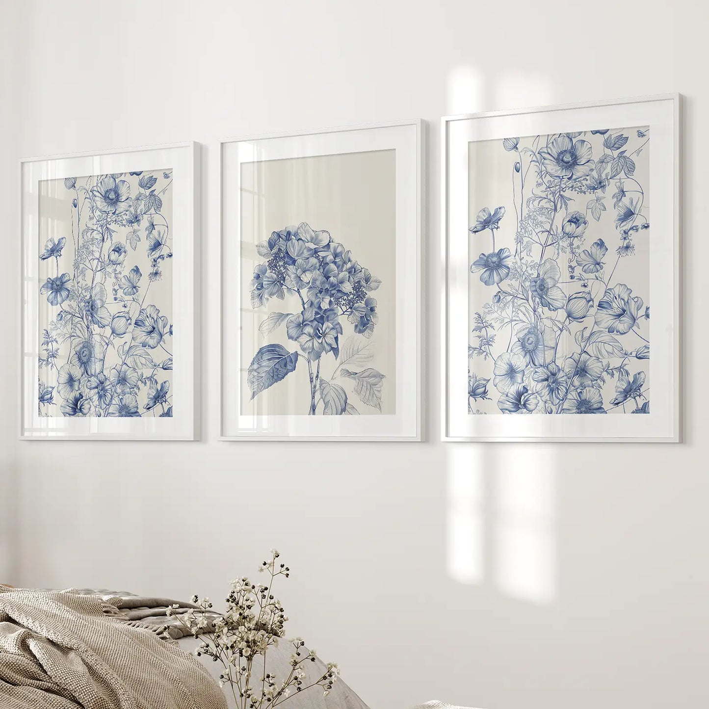 Blue Botanical Trendy Art Set Home Decor. White Frames with Mat Over the Bed.