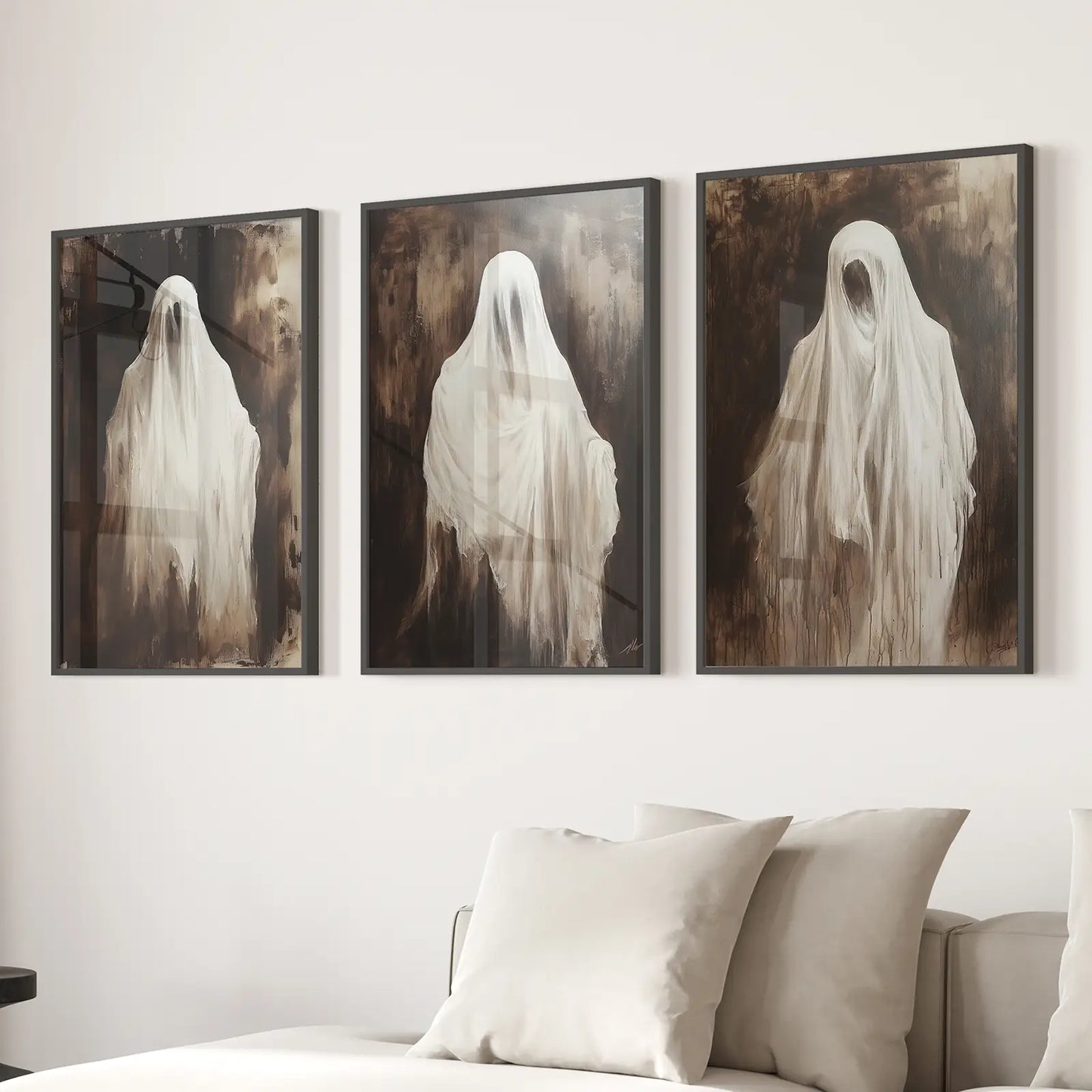Scary ghost triptych wall art in neutral dark brown moody background. Black frames for living room.