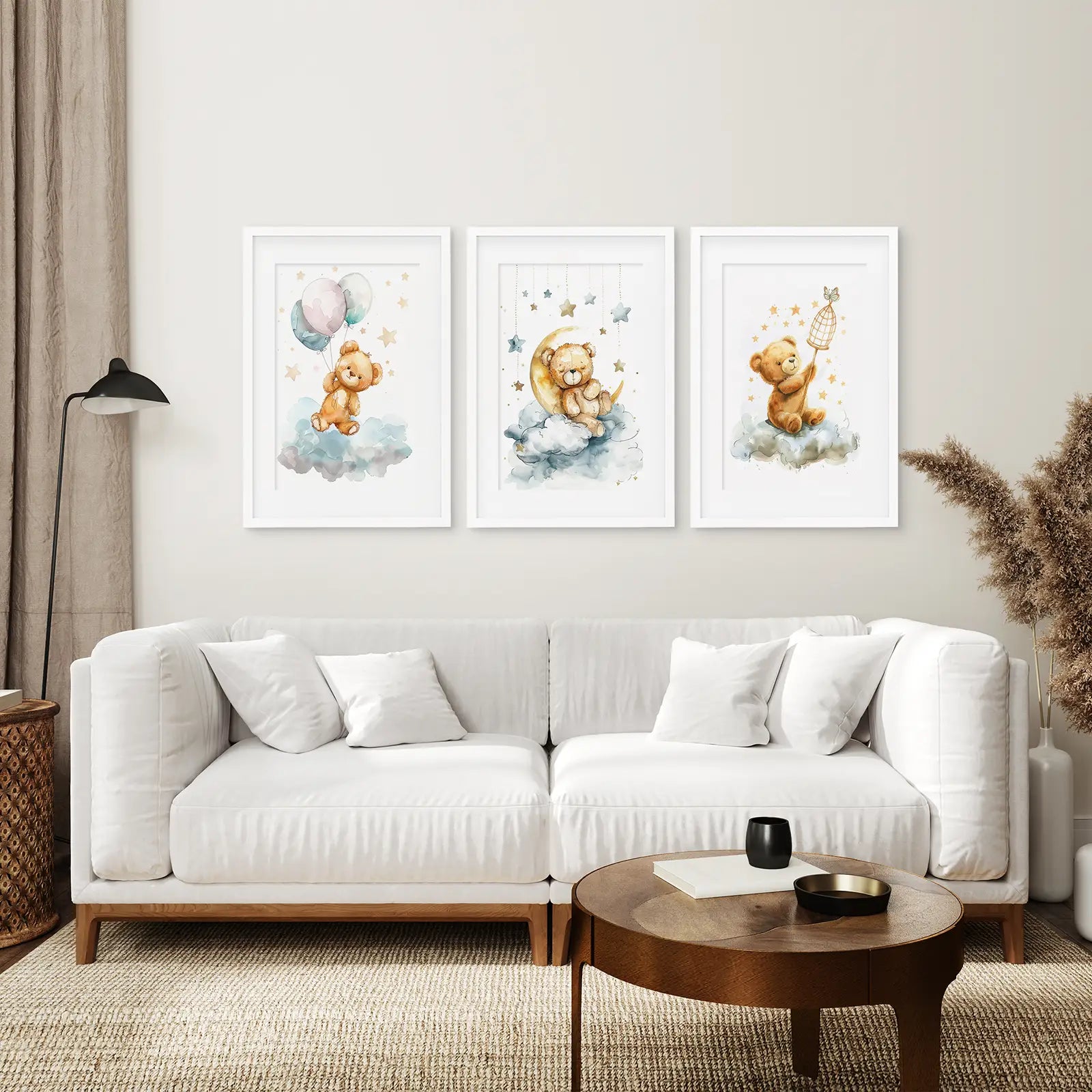Adorable baby bedroom art set with watercolor teddy bears and stars. White frames with mat above the sofa.