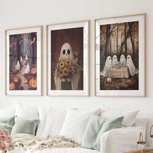 Spooky fall forest with pumpkins apartment decor prints. Thinwood frames with mat over the couch.