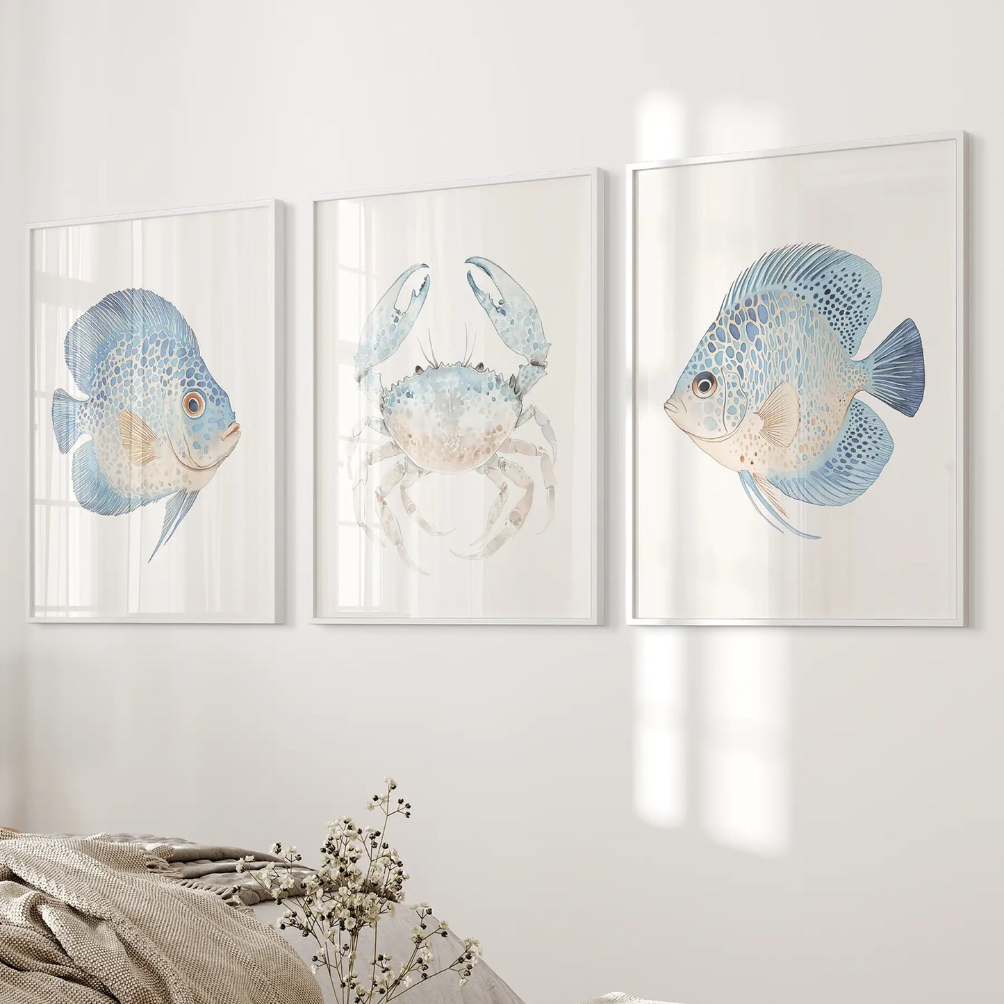 Nautical sea animal artwork. Beachy art print set. White frames Over the bed.