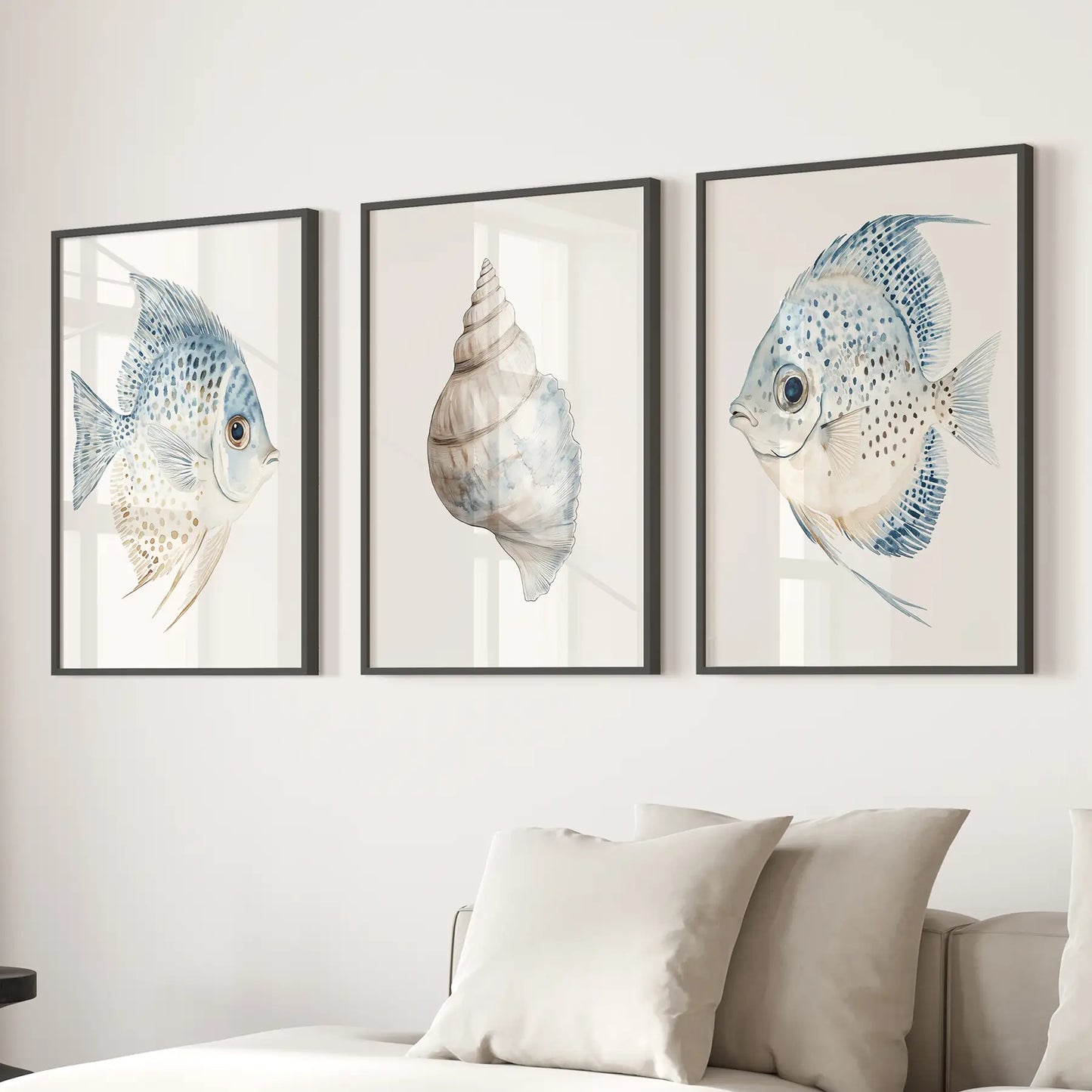 Tropical sea animal summer wall art. Marine coastal posters. Black frames above the sofa.