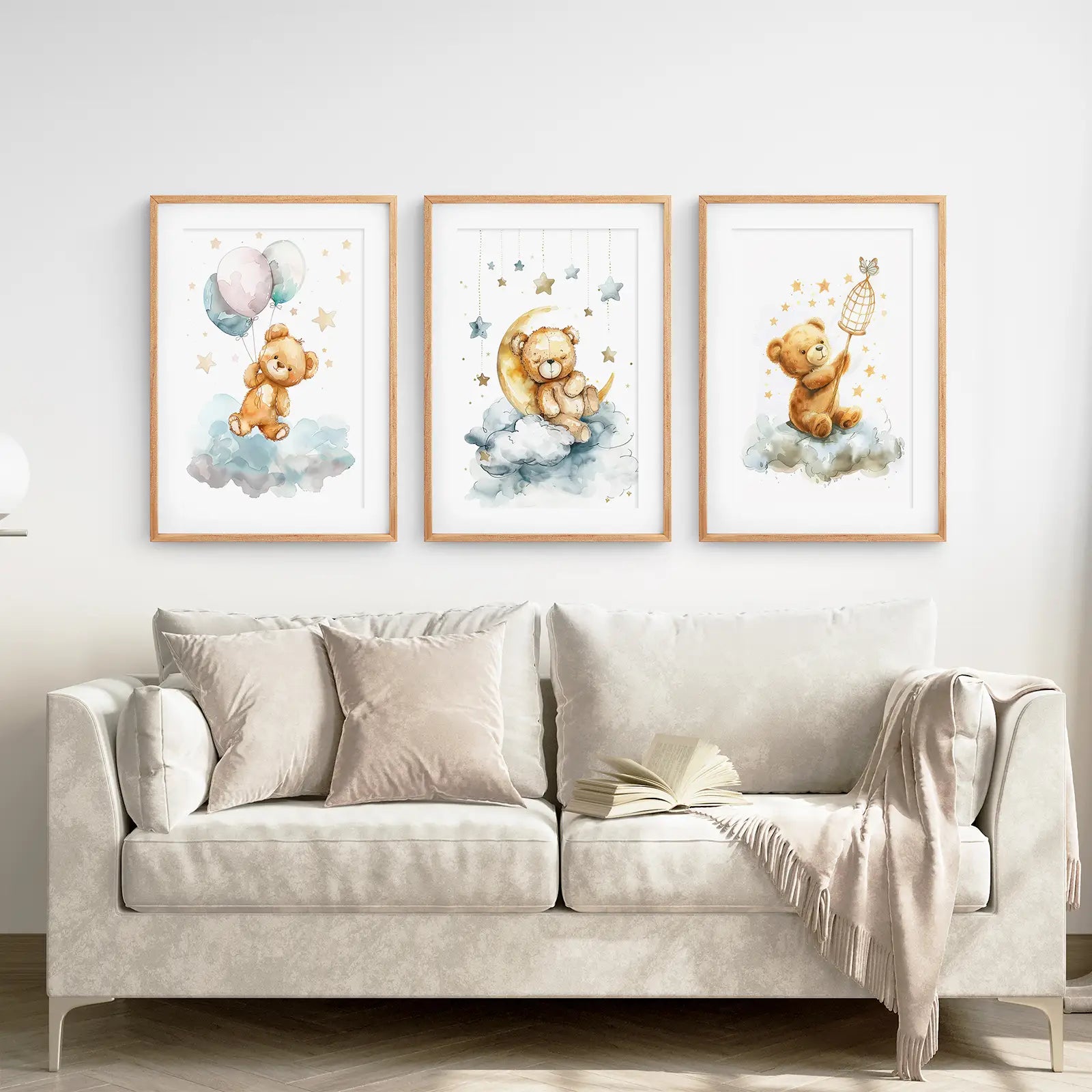 Soft beige and blue teddy bear art for neutral nursery walls. Thinwood frames with mat above  the sofa.