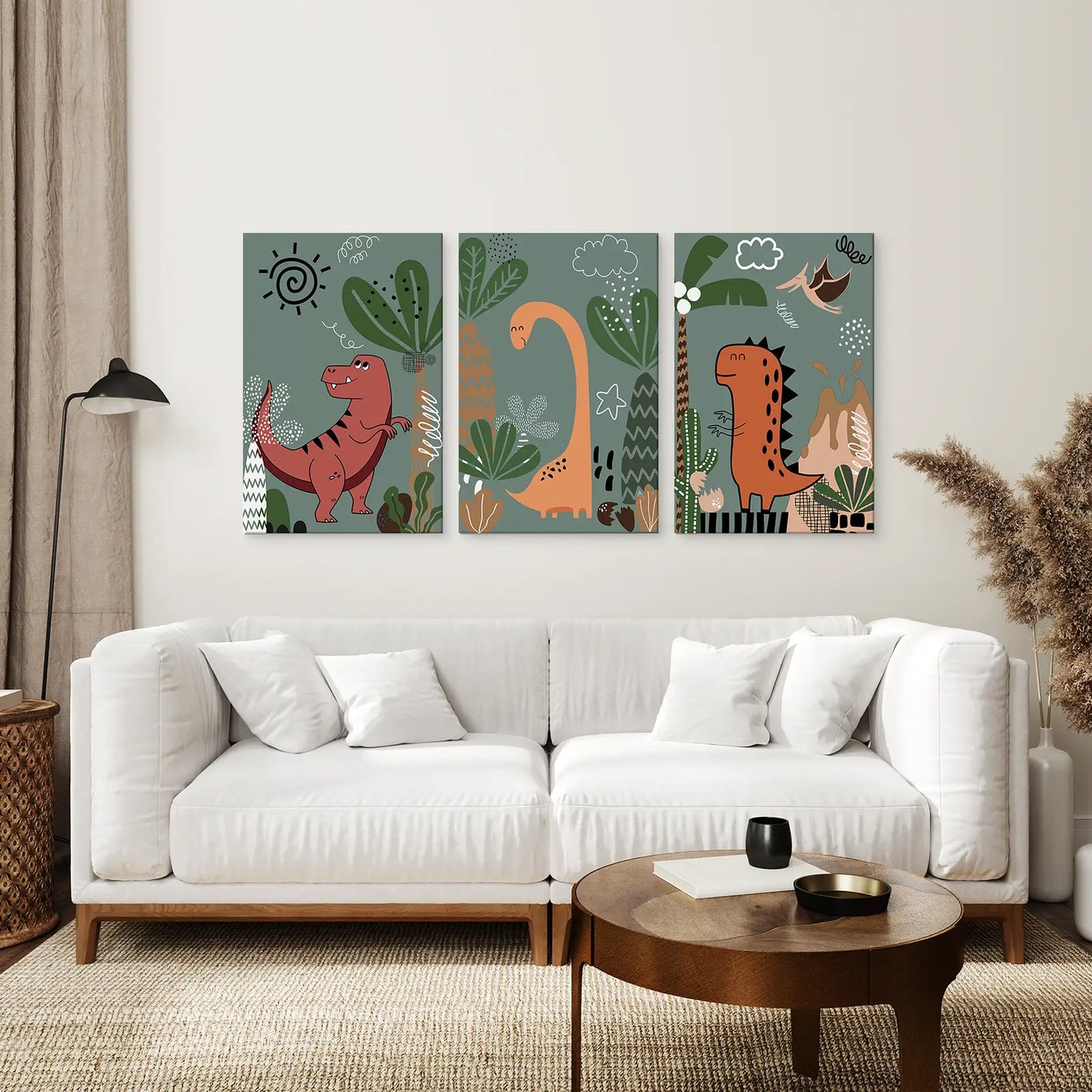 Dinosaur nursery wall art set of 3 prints with cute T-Rex, Brachiosaurus, and Stegosaurus. Wrapped canvas over the couch.