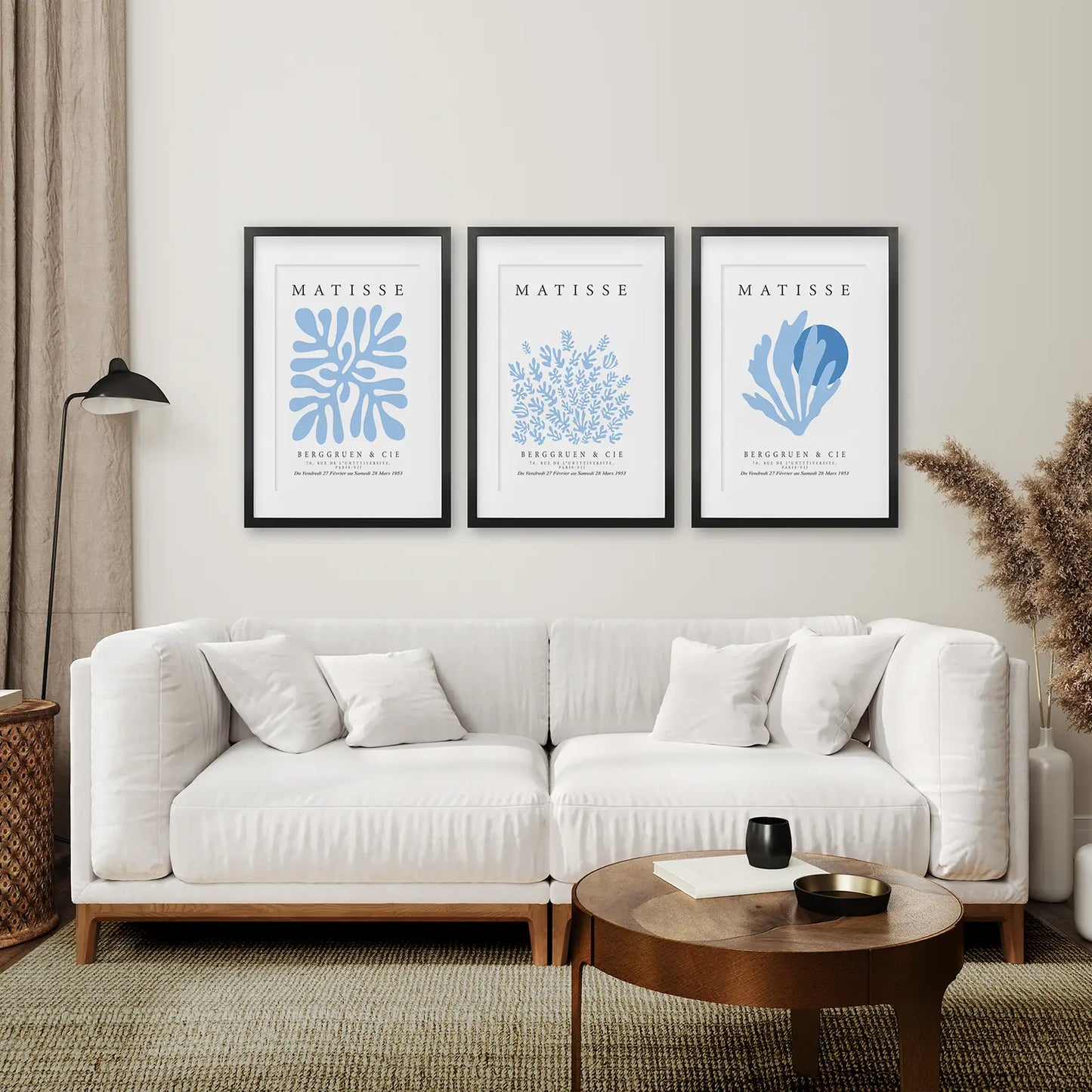 Trendy Modern Gallery Wall Set of 3 Posters. Black Frames with Mat Above the Sofa.