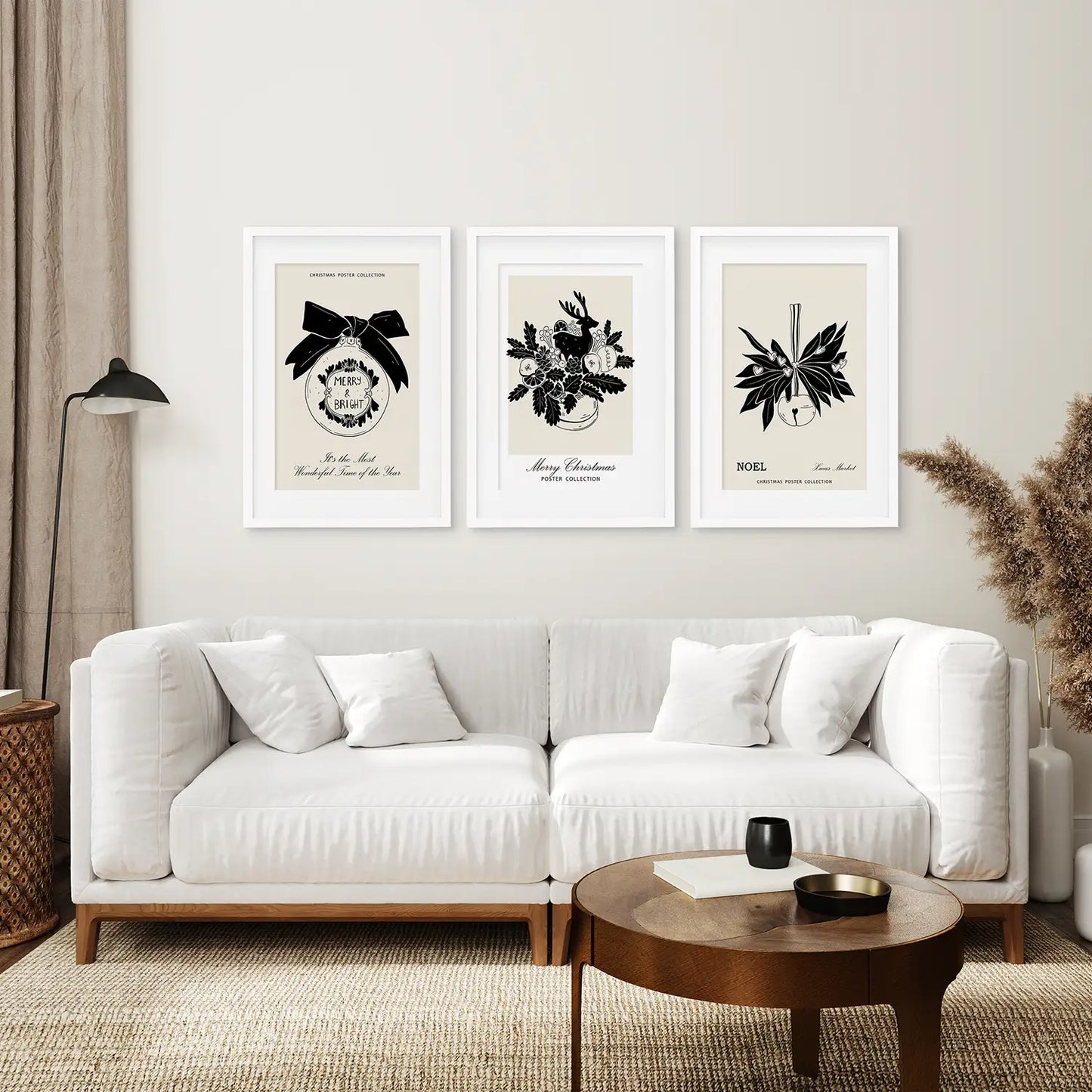 Merry Christmas Trendy Modern Prints. White Frames with Mat Above the Sofa.