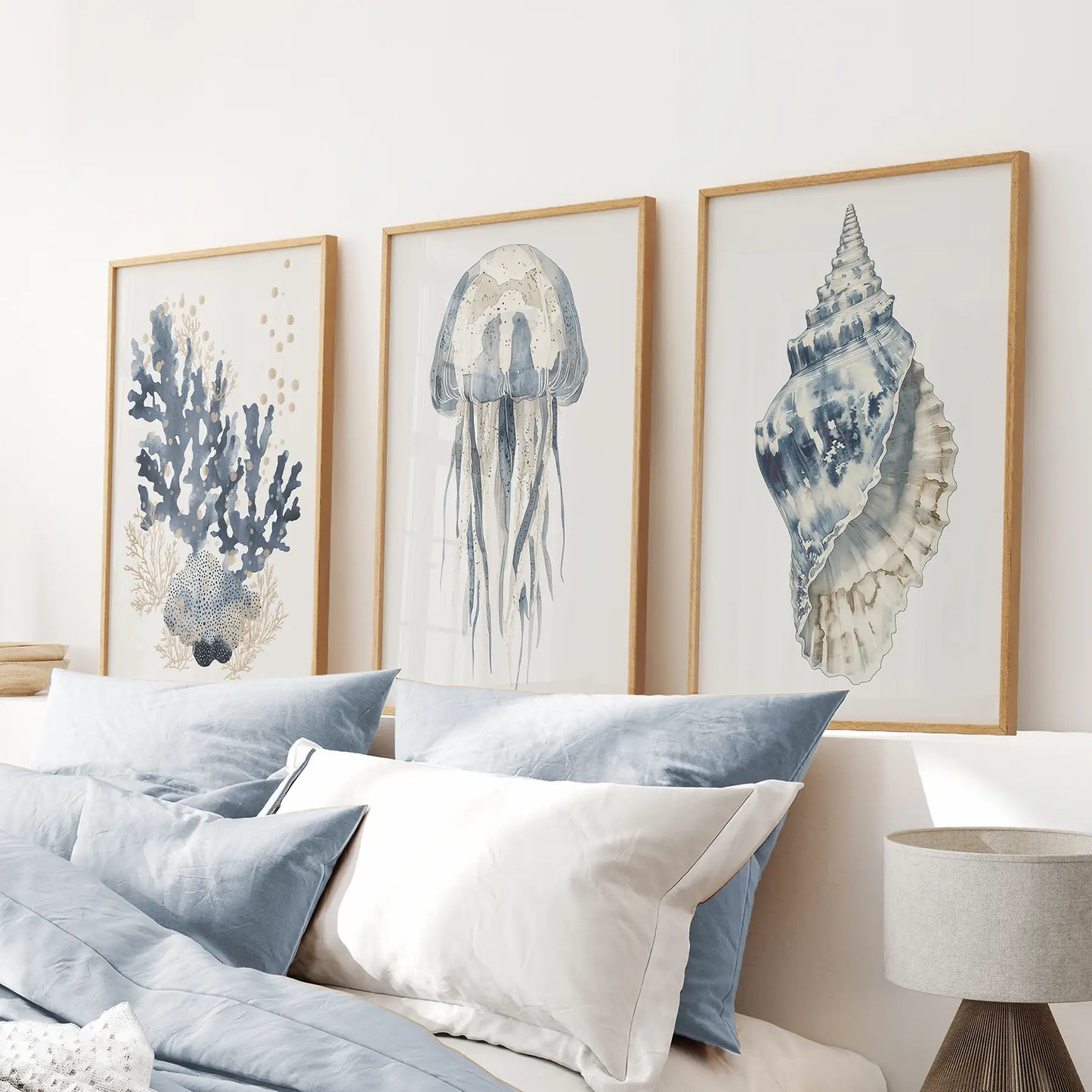 Vintage jellyfish poster decor. Underwater wall art prints. Thinwood frames above the bed.
