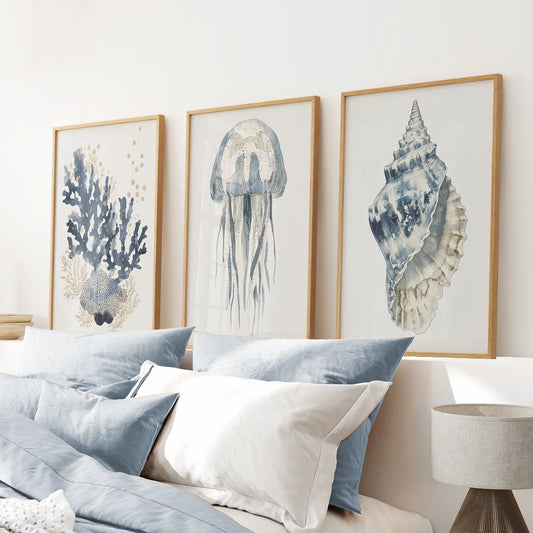 Vintage jellyfish poster decor. Underwater wall art prints. Thinwood frames above the  bed.