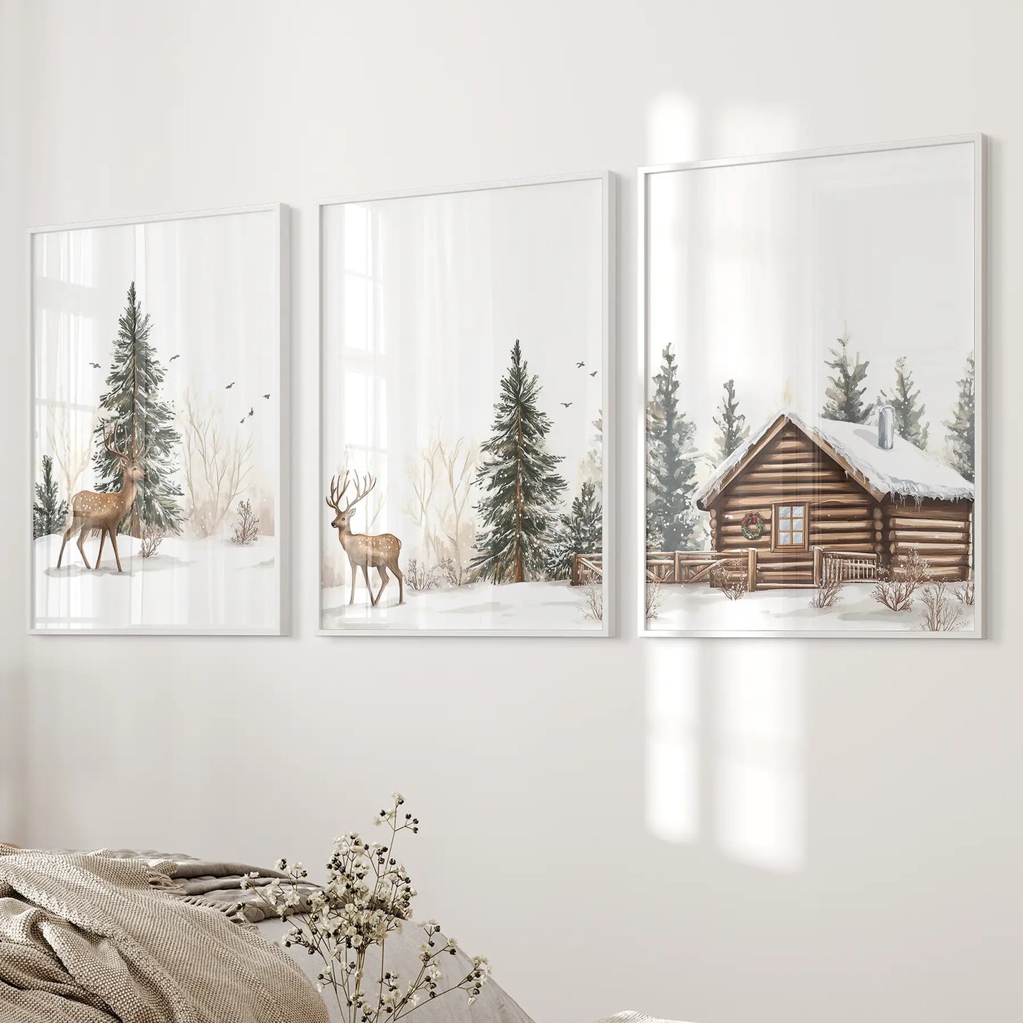 Rustic country farmhouse decor gallery wall art. Snowy winter cabin forest poster. White frames above the bed.