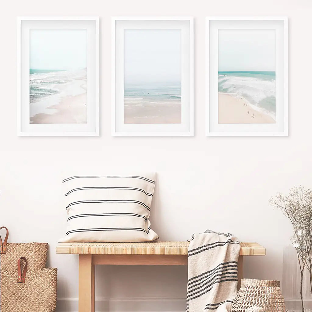 Coastal triptych. Ocean beach and waves. White frames with mat in the bathroom.