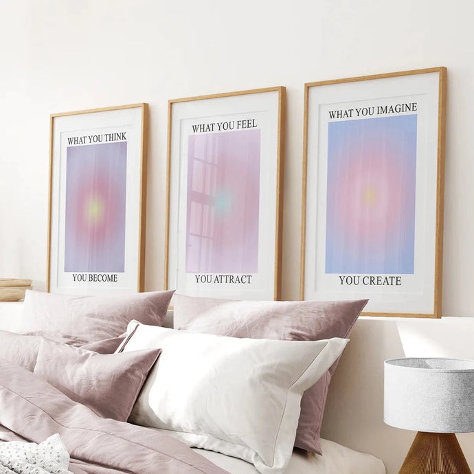 Trendy Aura Affirmation Set of 3 Prints. Thin Wood Frames Over the Bed.