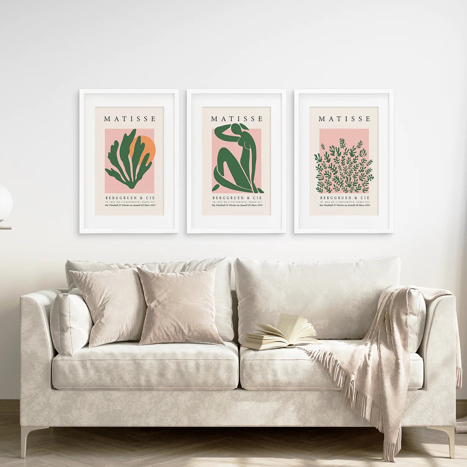 Room Decor Set Prints Matisse Exhibition Art. White Frames with Mat Above the Sofa.