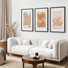 Load image into Gallery viewer, Flower Market Wall Art Decor Prints. Black Frames with Mat Above the Sofa.

