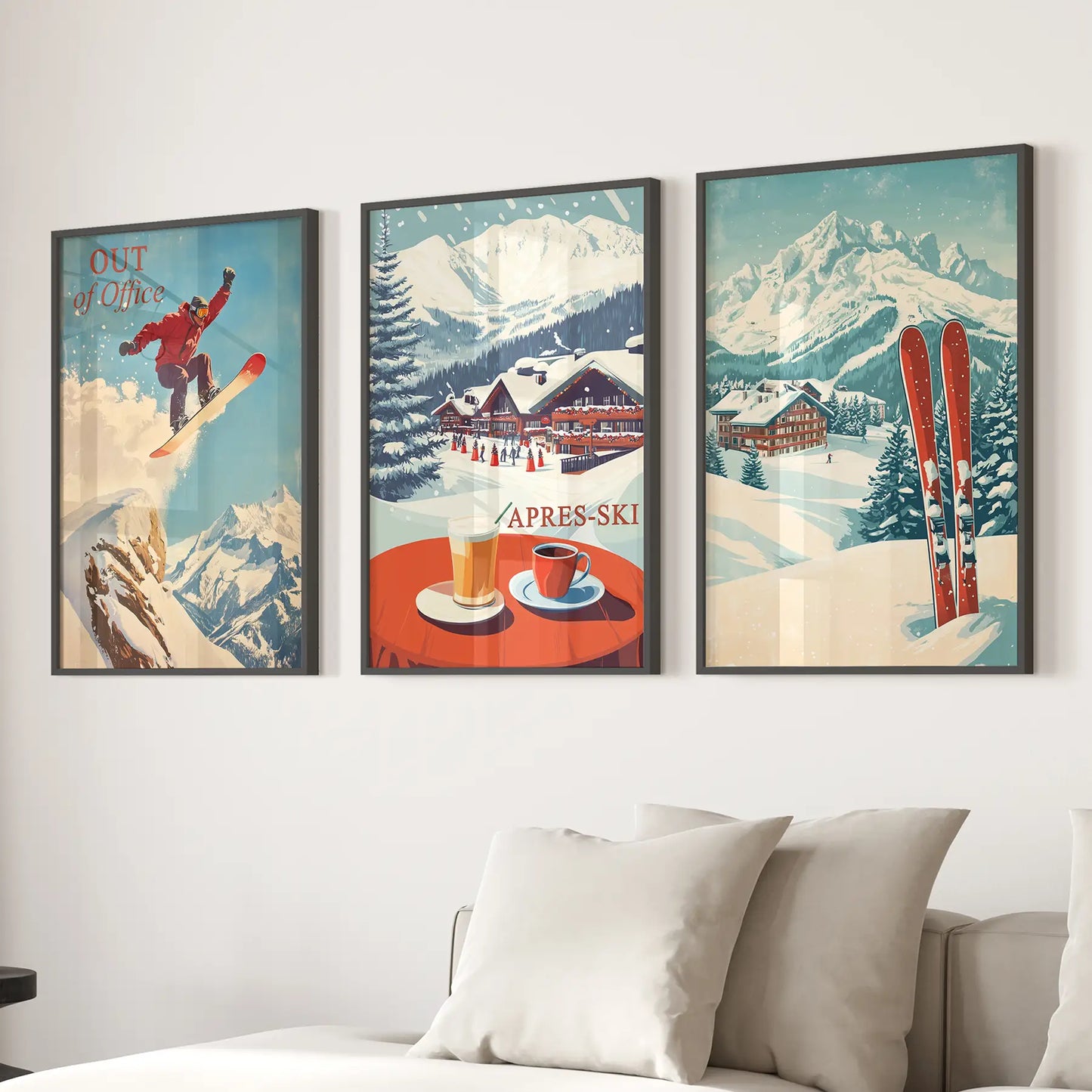 Retro après ski wall prints featuring mountain lodge and coffee. Black frames over the couch.