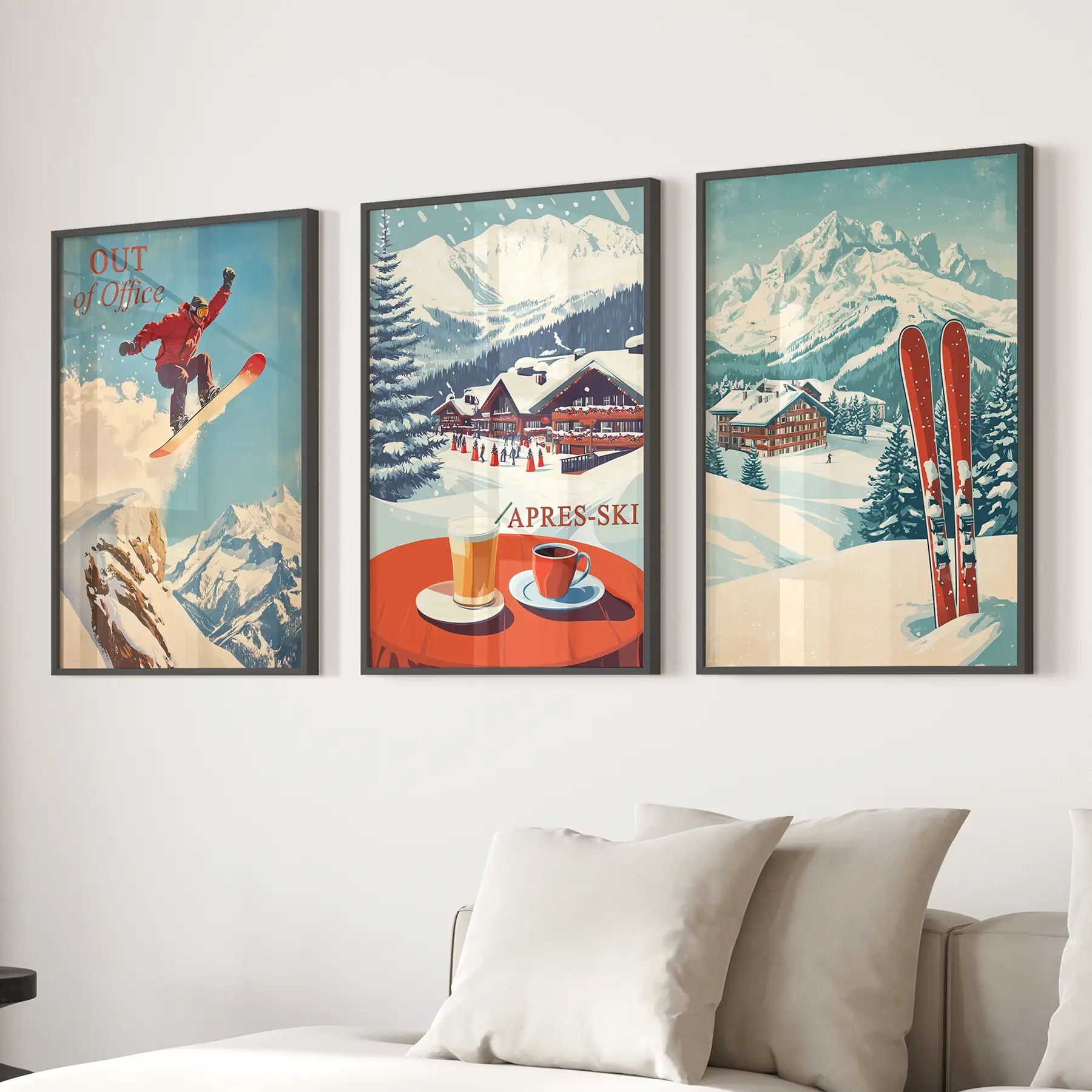 Retro après ski wall prints featuring mountain lodge and coffee. Black frames over the couch.
