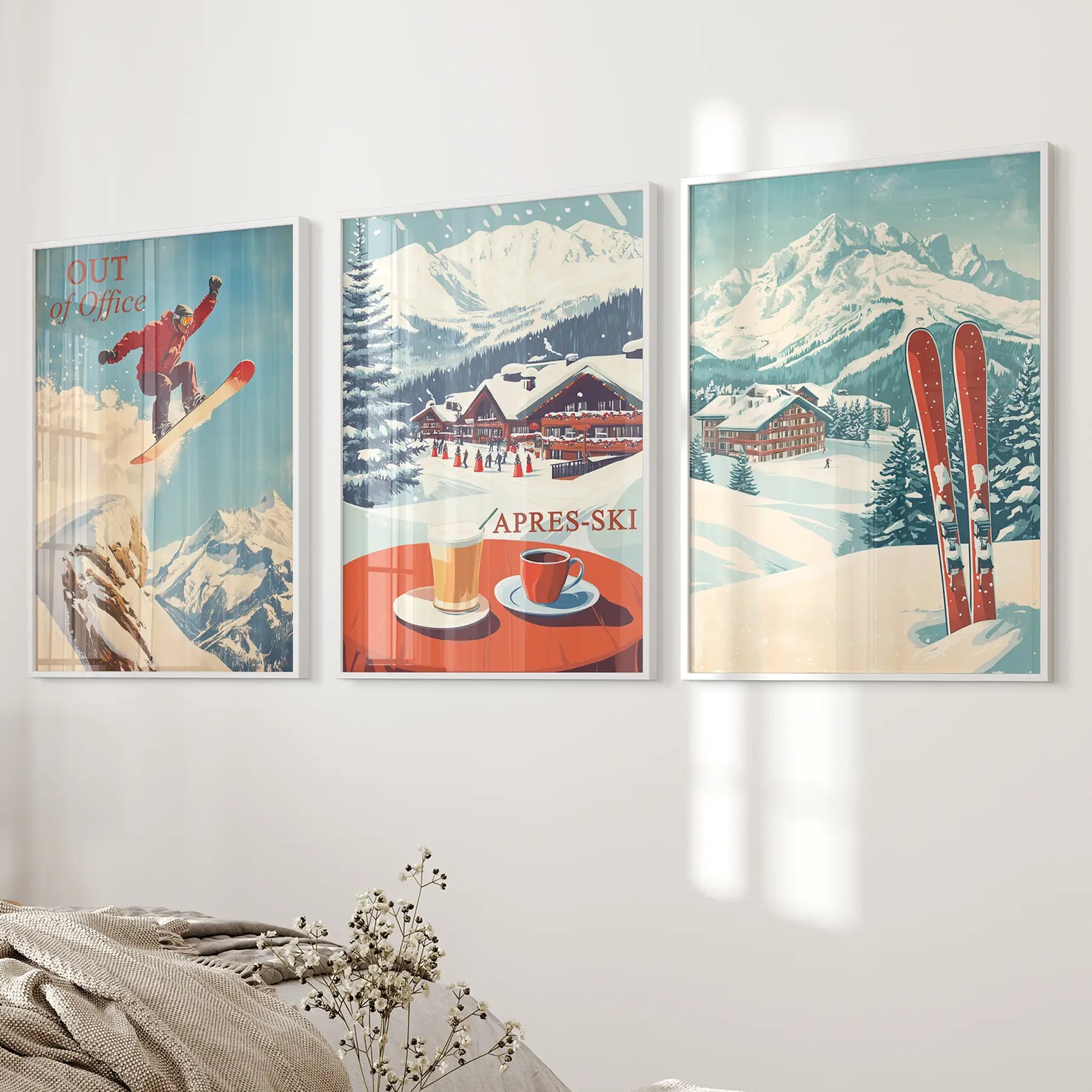 Alpine winter wall decor with skis and snowy mountain landscape. White frames for bedroom.