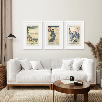 Trendy Modern Paintings Art Prints Set. White Frames with Mat Above the Sofa.