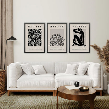 Vintage Exhibition Art Dorm Room Posters. Black Frames Above the Sofa.