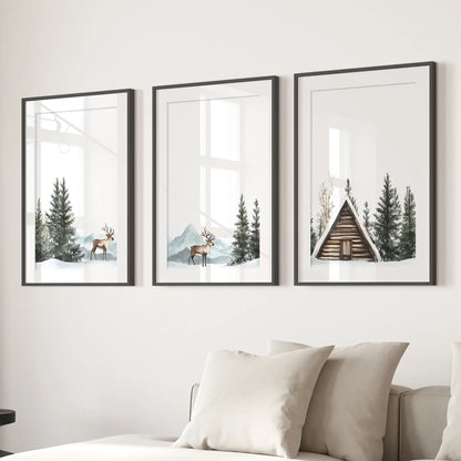 Rustic cabin in snowy pine forest wall decor. Black frames with mat over the couch.