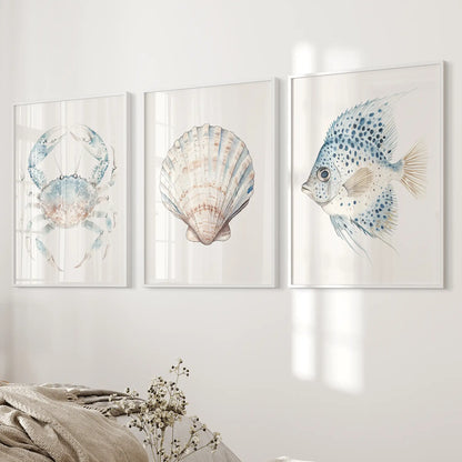 Watercolor ocean large prints. Ocean themed wall prints. White frames over the bed.