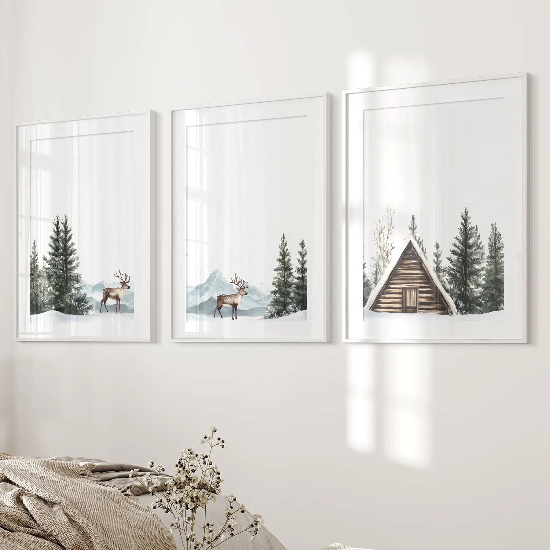 Woodland deer art print with snowy mountains. White frames with mat for bedroom.