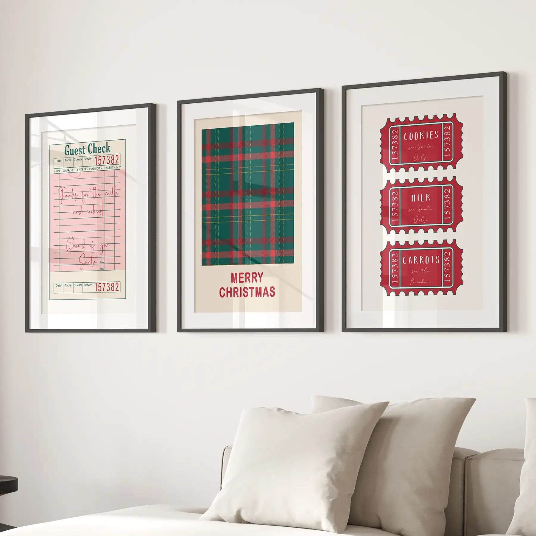 Cozy holiday wall decor set of 3 prints with retro Christmas elements including guest check, plaid, and treat tickets. Black frames with mat over the couch.