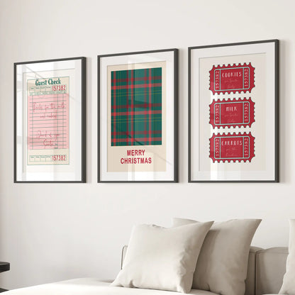 Cozy holiday wall decor set of 3 prints with retro Christmas elements including guest check, plaid, and treat tickets. Black frames with mat over the couch.