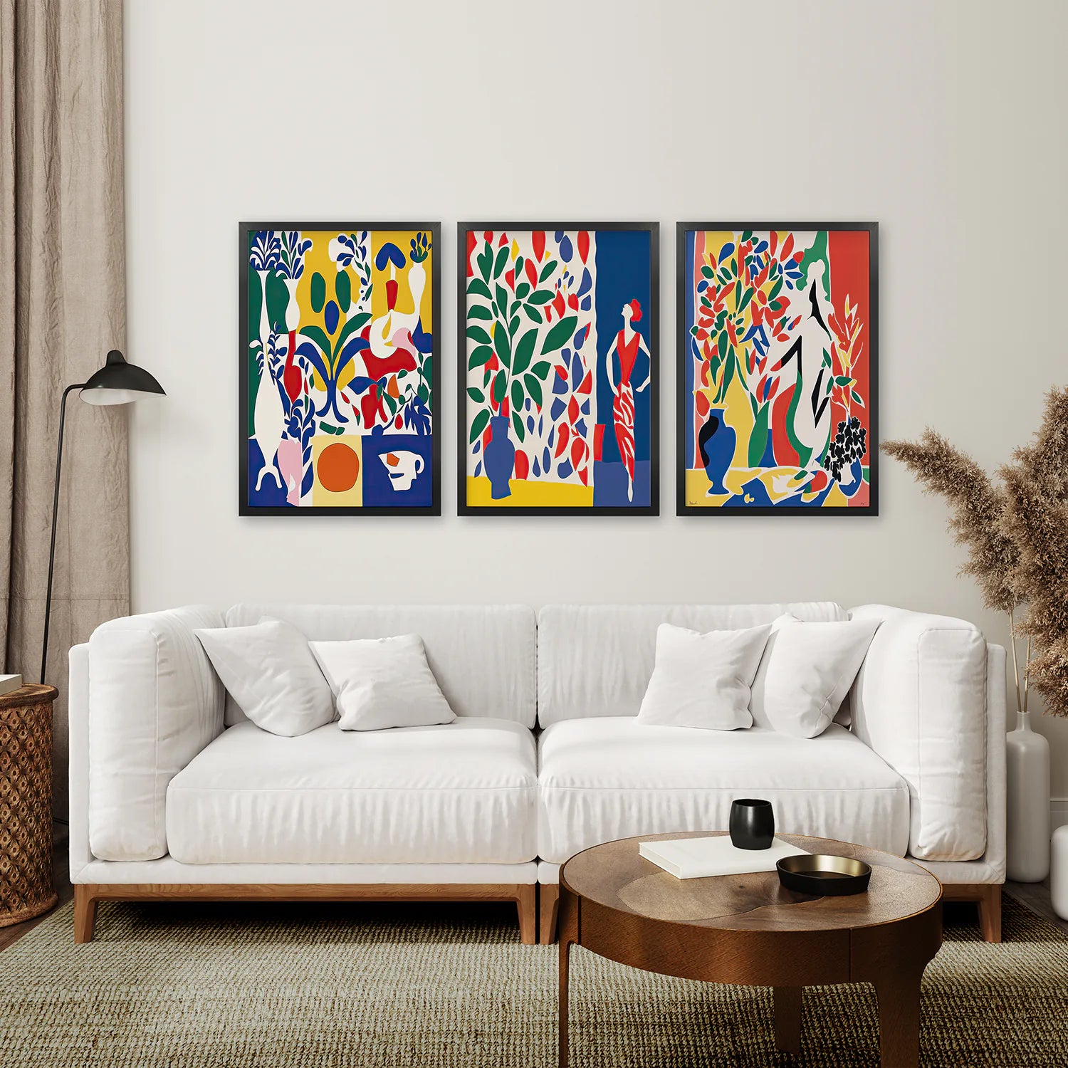 Modern Colorful Woman Figures Prints Poster. Black Frames Above the Sofa.