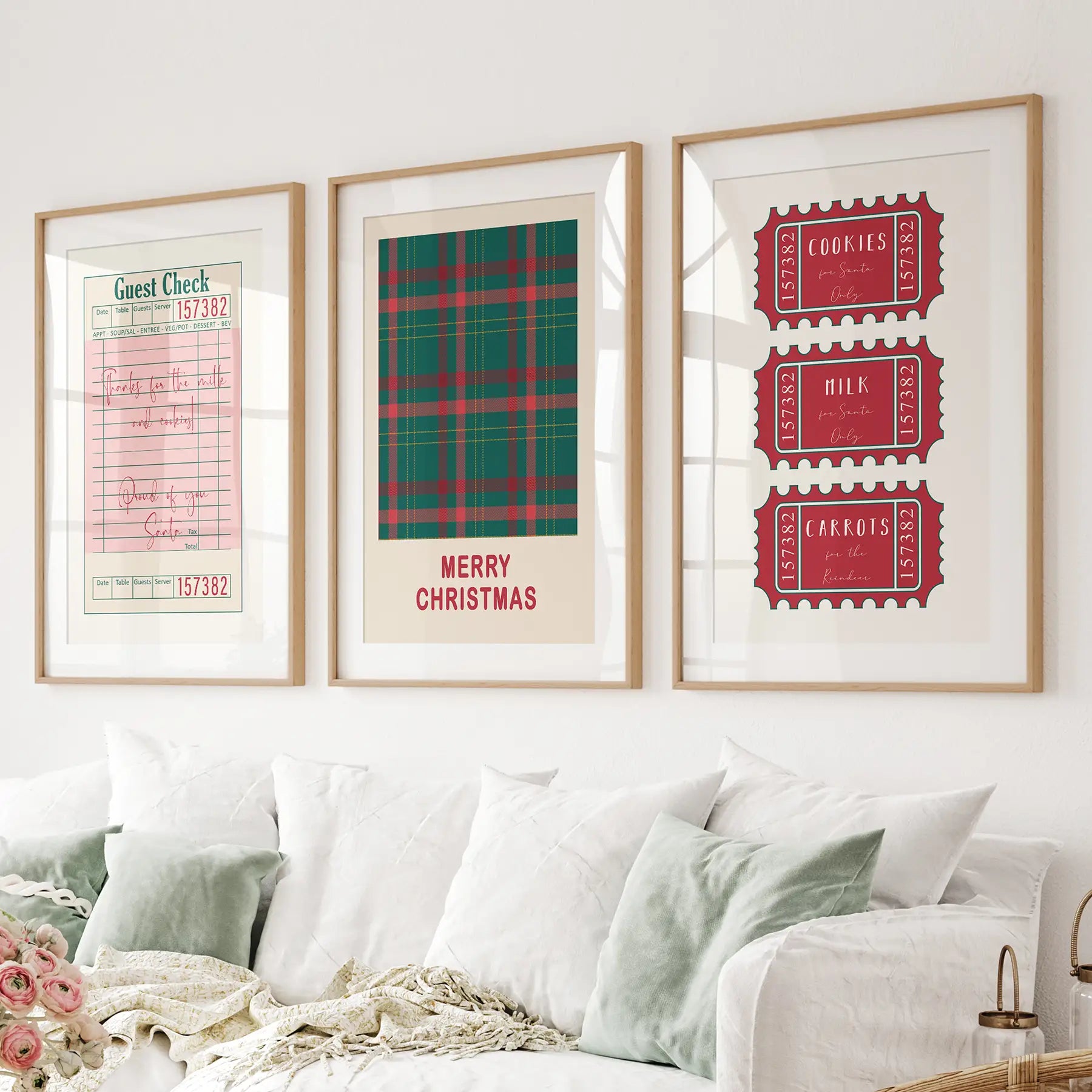 Red and green Christmas wall art set of 3 with Santa's receipt, plaid typography print, and fun North Pole ticket stubs. Thinwood frames with mat above the sofa.
