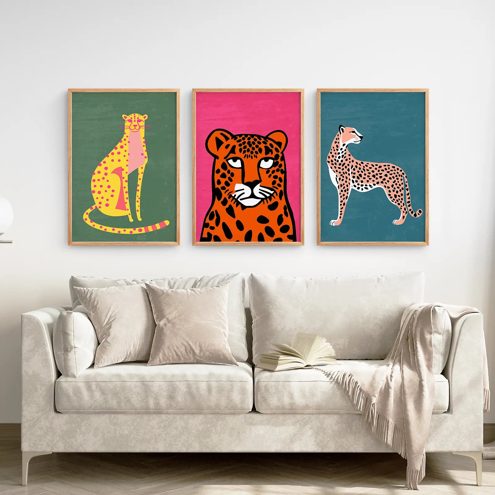 Leopard Jungle Painting Wall Art Set. Thinwood Frames Over the Coach.