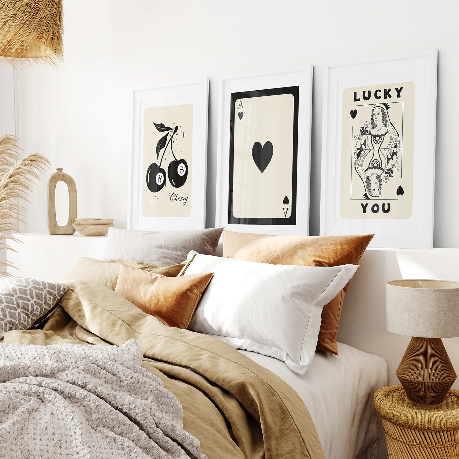 Beige Playing Card Poster Decor. White Frames with Mat Over the Bed.