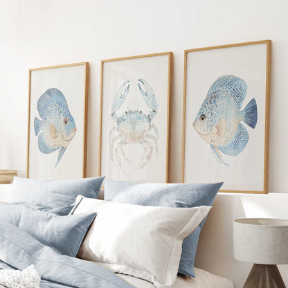 Contemporary beach house 3 piece prints.Modern home decor. Thinwood frames above the bed.