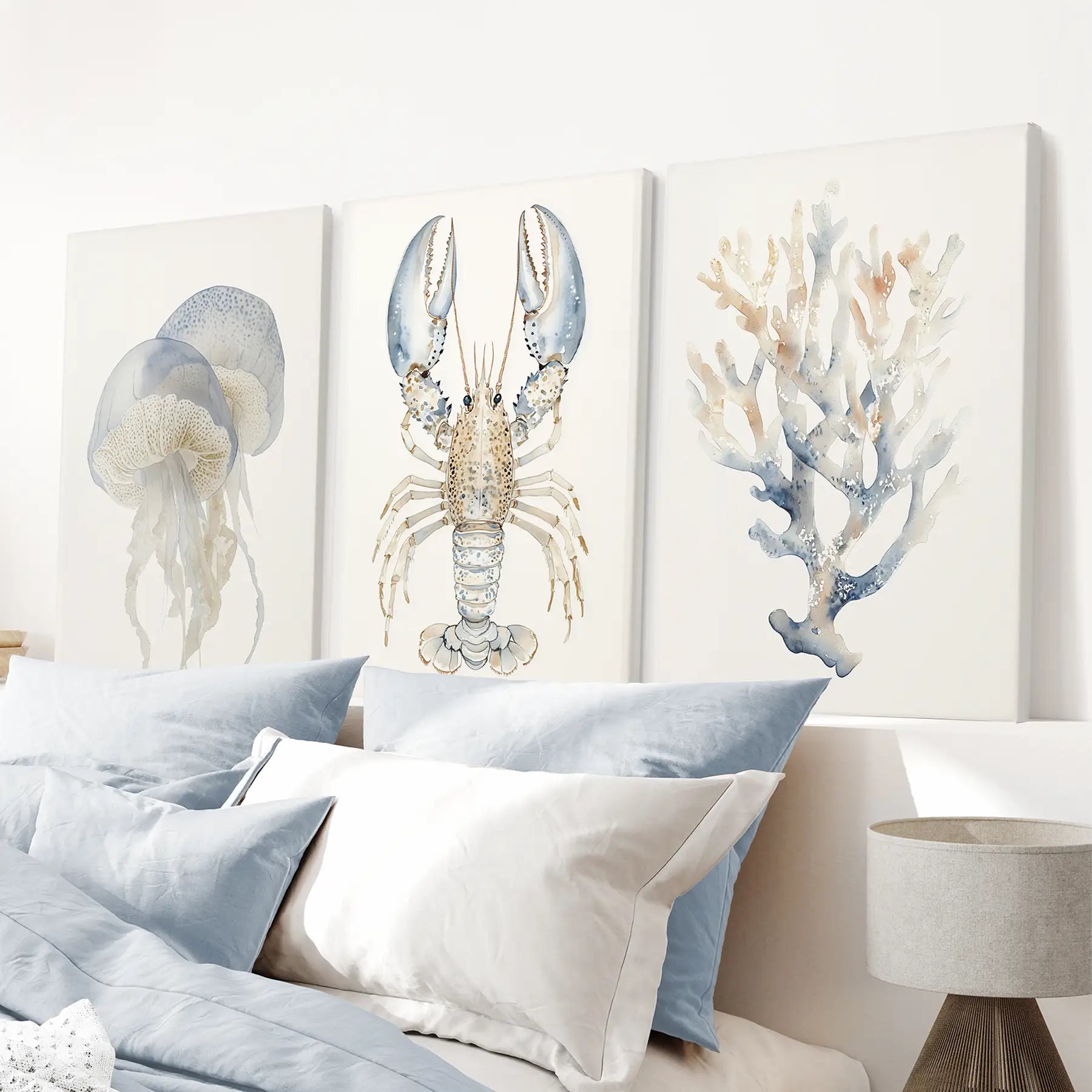 Marine hamptons wall decor. Trendy watercolor apartment prints. Wrapped canvas above the bed.