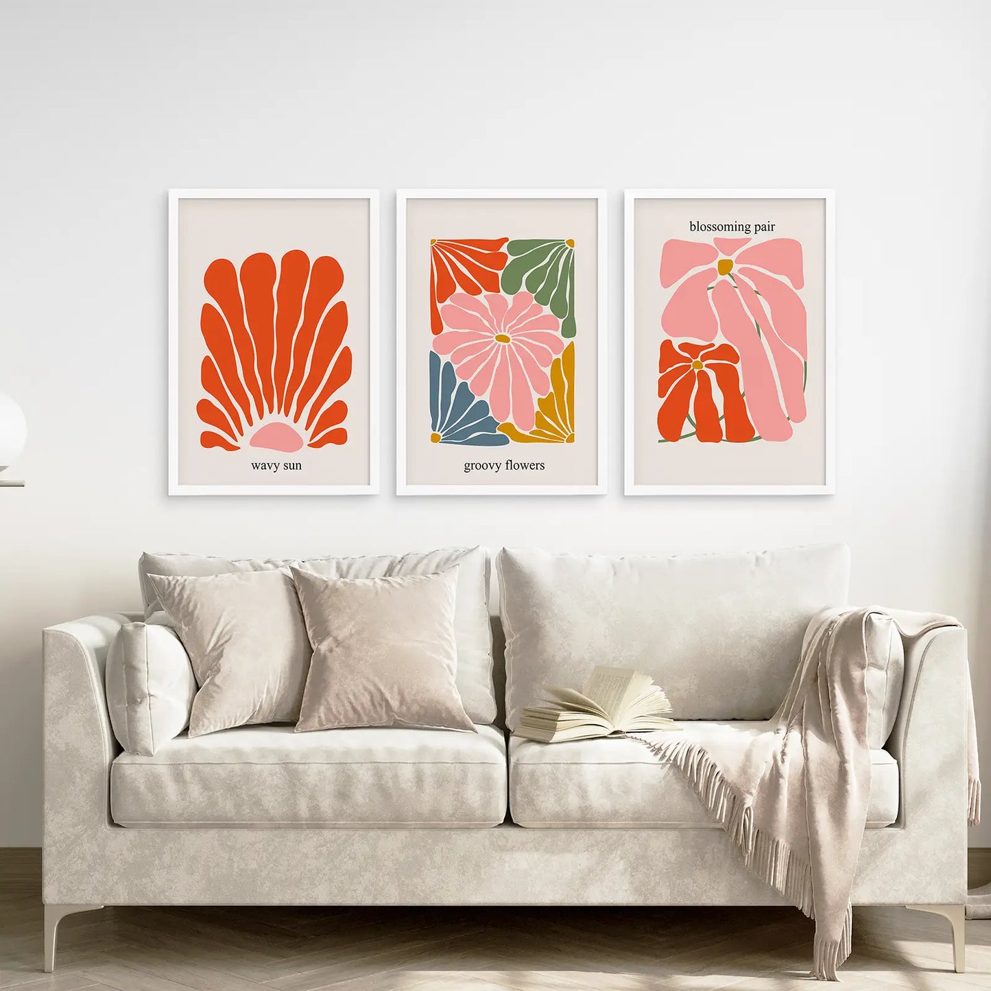 Trendy Exhibition Living Room Print Set. White Frames Above the Sofa.