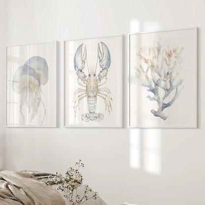 Jellyfish, lobster, coral marine wall art. Ocean animals artwork. White frames over the bed.