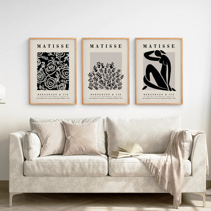 Nu Bleu Black Beige Vintage Matisse Prints. Thin Wood Frames Over the Coach.