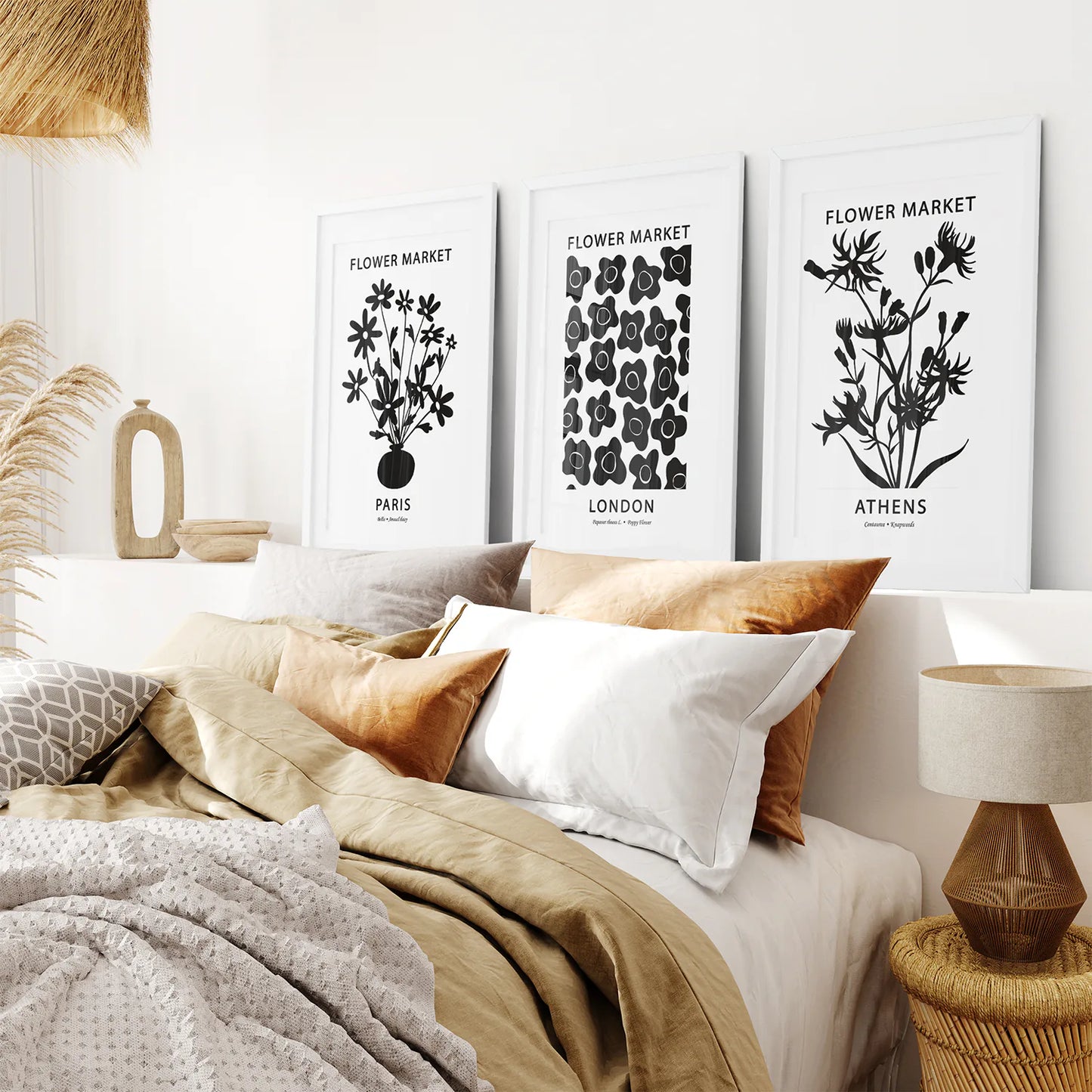 Modern Black and White Travel set of 3 Prints. White Frames with Mat Over the Bed.