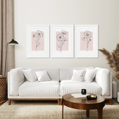 Trendy Floral Line Art Prints Set. White Frames with Mat Above the Sofa.