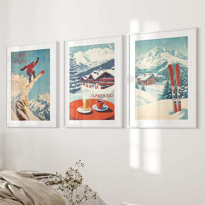 Mountain chalet artwork with skier, snowboarder, and après ski vibe. White frames with mat over the bed.