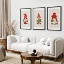 Load image into Gallery viewer, Christmas Themed Prints Kids Room Wall Art. Black Frames with Mat Over the Coach.
