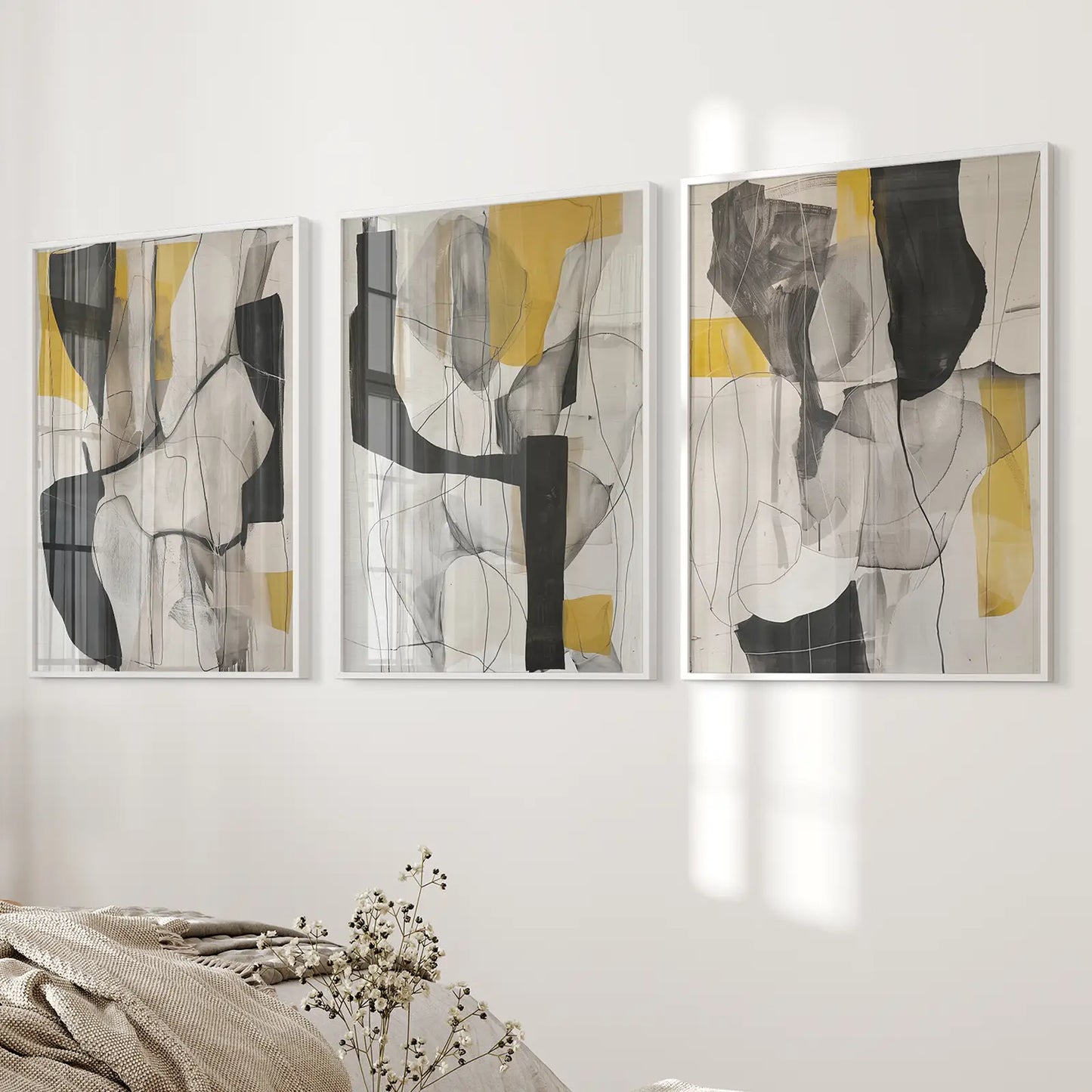 Modern Neutral Minimalist Golden Wall Art. White Frames Above the Bed.