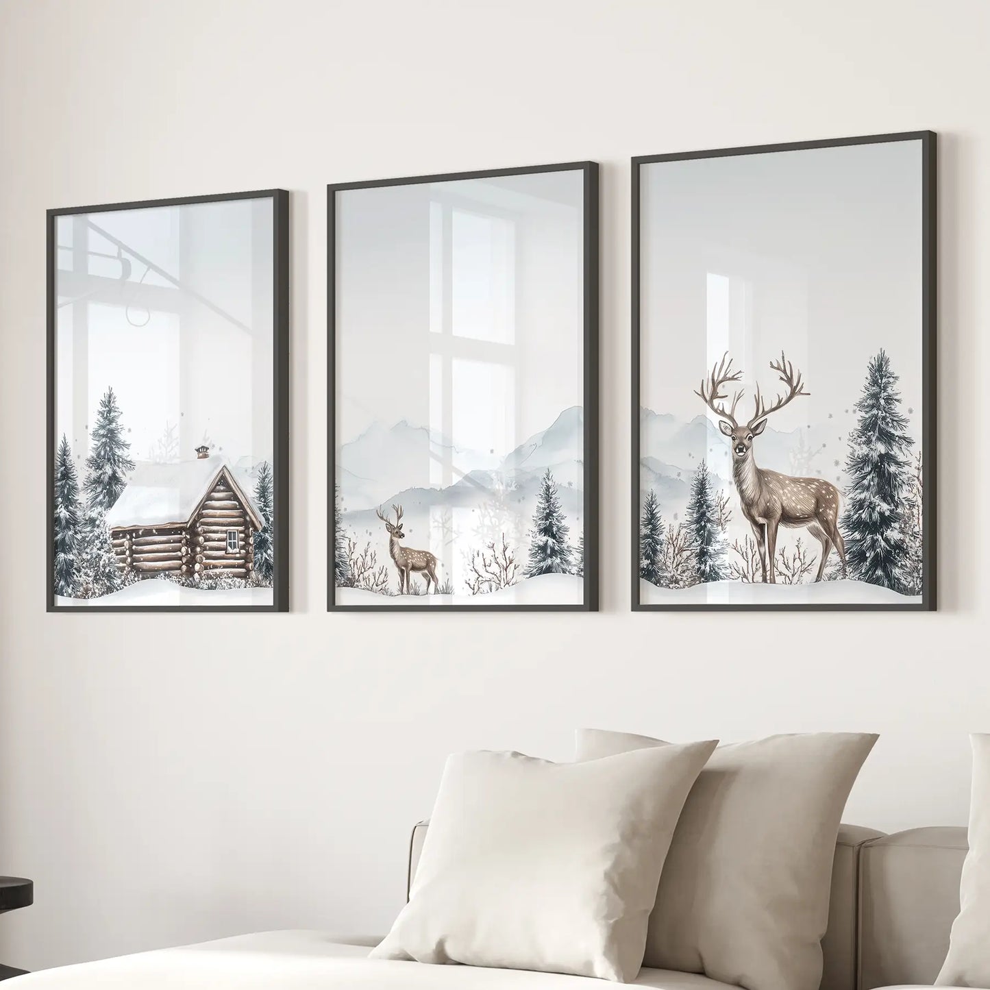 Cozy cabin winter art set seasonal prints for apartment decor. Black frames over the couch.