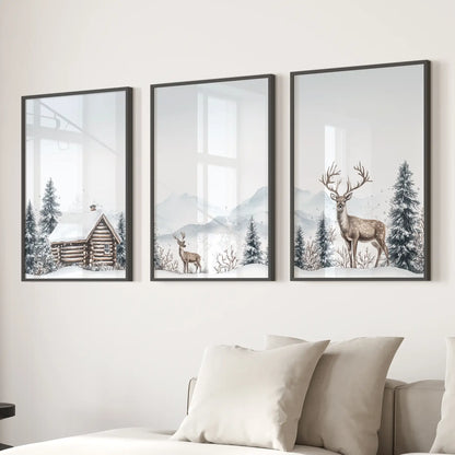 Cozy cabin winter art set seasonal prints for apartment decor. Black frames over the couch.